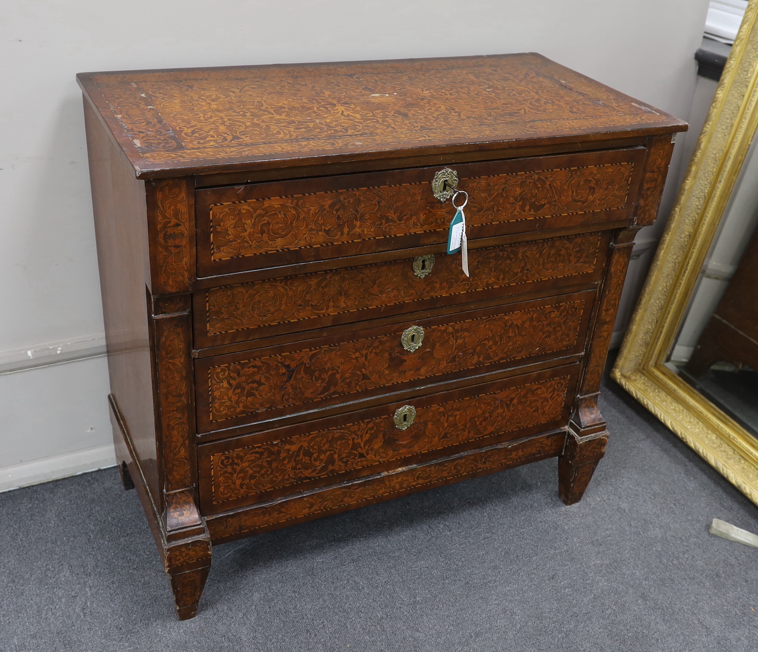 An early 19th century Dutch floral marquetry walnut commode, width 98cm, depth 49cm, height 90cm